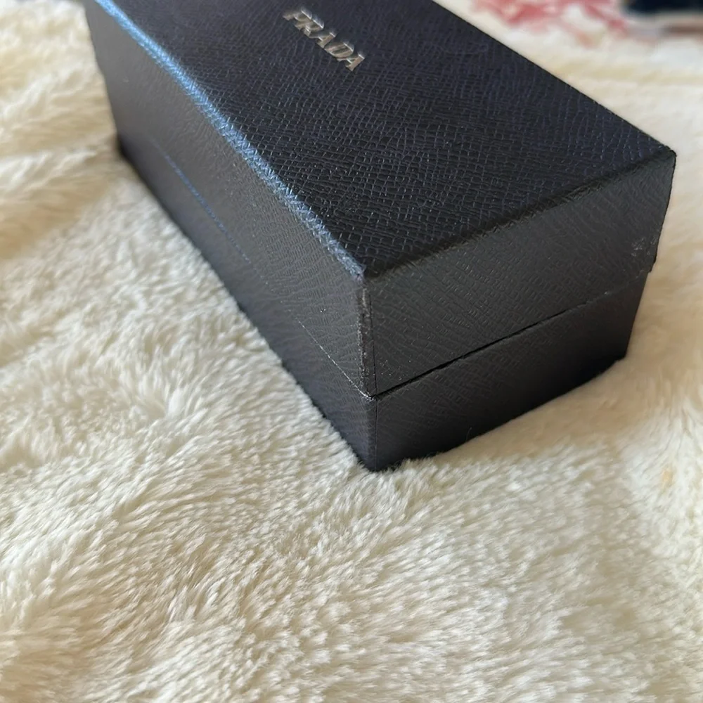 Prada White Frame Sunglasses with Dark Lenses